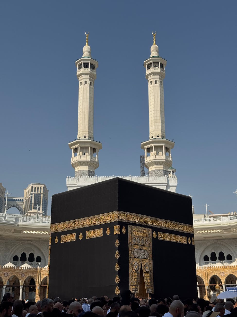 kaaba in mecca with crowds of pilgrims